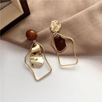 Minimalist gold dangle earrings for women